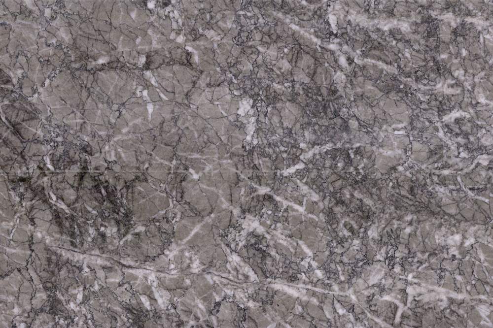 Alcor, light warm grey natural stone swatch